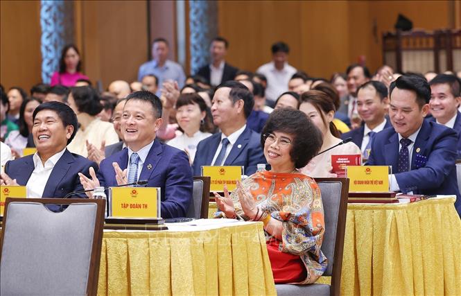Đại diện các doanh nghiệp tham dự buổi gặp nhân Ngày Doanh nhân Việt Nam. Ảnh: Dương Giang-TTXVN
