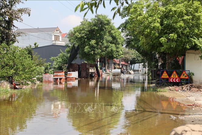 Một đoạn đường ngập tại xã Sóc Sơn. Ảnh: Vũ Quang - TTXVN