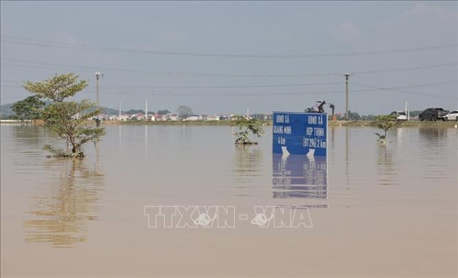 Mực nước dâng cao chưa từng có trong lịch sử. Ảnh: Trần Việt - TTXVN 