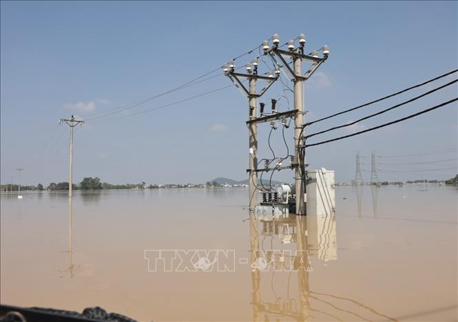 Cả khu vực thuộc thôn Đa Hội chìm trong nước. Ảnh: Trần Việt - TTXVN 