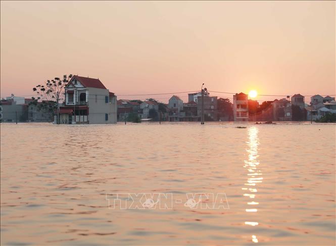 Nước nhấn chìm nhiều ngôi nhà tại các tổ dân phố Yên Viên, Vân Hà, Thổ Hà, phường Vân Hà, tỉnh Bắc Ninh. Ảnh: Phan Phương - TTXVN