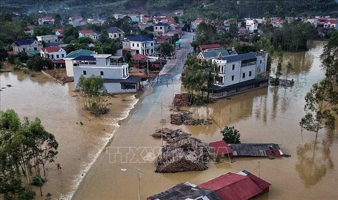 Nhiều thôn tại xã Bố Hạ vẫn ngập sâu trong nước. Ảnh: Danh Lam -TTXVN