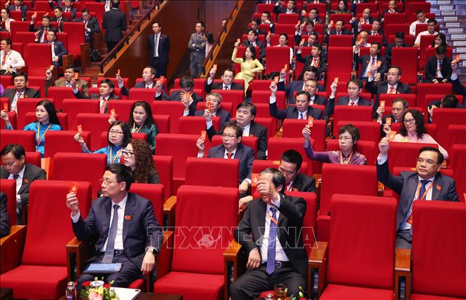Các đại biểu biểu quyết thông qua Chương trình làm việc của Đại hội. Ảnh: Văn Điệp - TTXVN