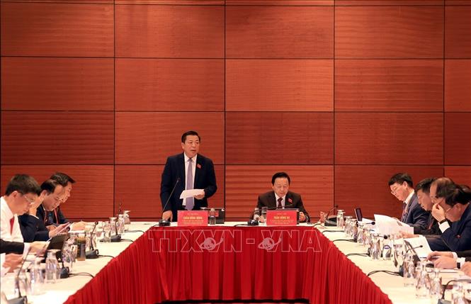 Các đại biểu thảo luận tại tổ 5, chiều 12/10. Ảnh: Tuấn Anh - TTXVN