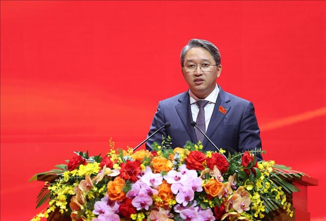 Đồng chí Nguyễn Hải Ninh, Ủy viên Trung ương Đảng, Ủy viên BCH Đảng bộ Chính phủ, Bí thư Đảng ủy, Bộ trưởng Bộ Tư pháp trình bày tham luận. Ảnh: Dương Giang-TTXVN 
