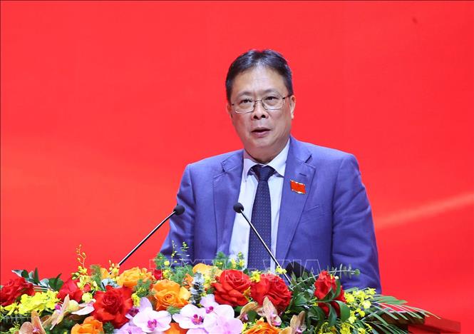 Đồng chí Châu Văn Minh, Ủy viên Trung ương Đảng, Ủy viên Ban Chấp hành Đảng bộ Chính phủ, Bí thư Đảng ủy, Chủ tịch Viện Hàn lâm Khoa học và Công nghệ Việt Nam trình bày tham luận. Ảnh: Văn Điệp - TTXVN