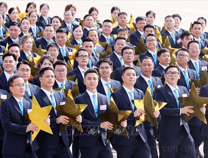 Khối Doanh nhân Việt Nam tham dự Lễ kỷ niệm, diễu binh, diễu hành 80 năm Cách mạng tháng Tám thành công và Quốc khánh nước CHXHCN Việt Nam (2/9/1945 - 2/9/2025) tại Quảng trường Ba Đình. Ảnh: Thống Nhất - TTXVN