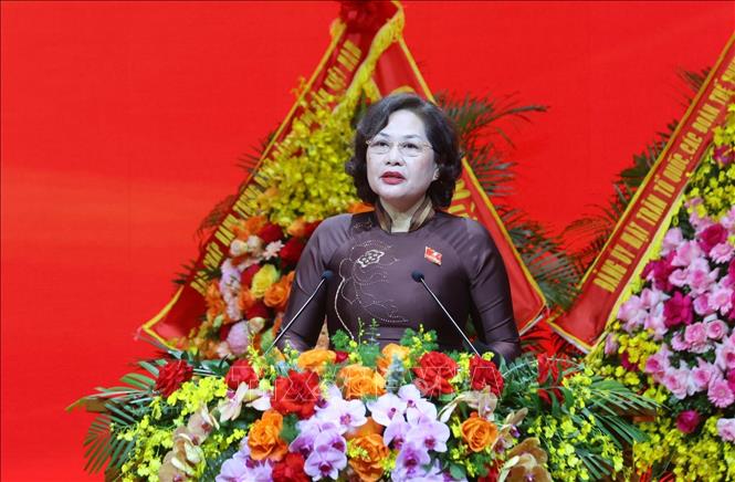 Đồng chí Nguyễn Thị Hồng, Ủy viên Trung ương Đảng, Thống đốc Ngân hàng Nhà nước Việt Nam trình bày tham luận. Ảnh: Phạm Kiên - TTXVN 