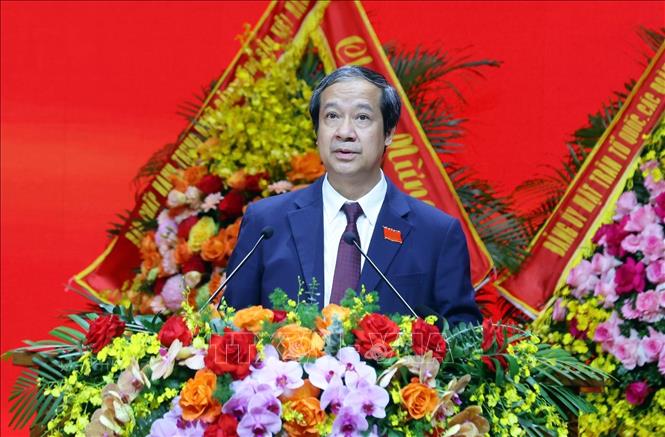 Đồng chí Nguyễn Kim Sơn, Ủy viên Trung ương Đảng, Bộ trưởng Bộ Giáo dục và Đào tạo trình bày tham luận. Ảnh: Phạm Kiên - TTXVN