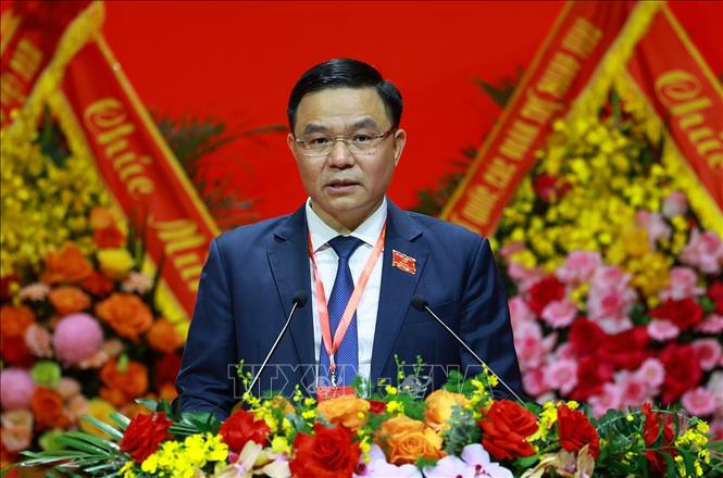 Đồng chí Lê Mạnh Hùng, Bí thư Đảng uỷ, Chủ tịch Tập đoàn Công nghiệp - Năng lượng Quốc gia Việt Nam trình bày tham luận. Ảnh: Dương Giang-TTXVN 