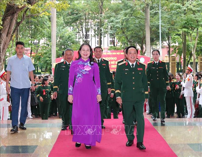 Đại tướng Trịnh Văn Quyết và Phó Chủ tịch nước Võ Thị Ánh Xuân đến dự. Ảnh: Trọng Đức - TTXVN