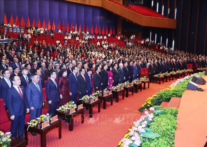 Tổng Bí thư Tô Lâm và các đại biểu thực hiện nghi lễ chào cờ. Ảnh: Thống Nhất-TTXVN
