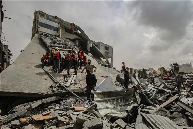 Những tòa nhà bị phá hủy do xung đột tại Dải Gaza. Ảnh: THX/TTXVN