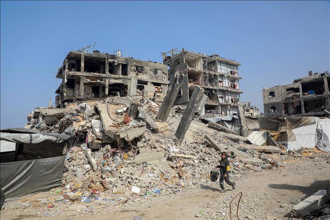 Những tòa nhà bị phá hủy do xung đột tại Dải Gaza. Ảnh: THX/TTXVN