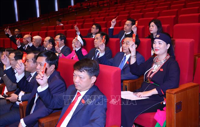 Đại hội biểu quyết số lượng đại biểu dự khuyết dự Đại hội đại biểu toàn quốc lần thứ XIV của Đảng. Ảnh: Văn Điệp – TTXVN