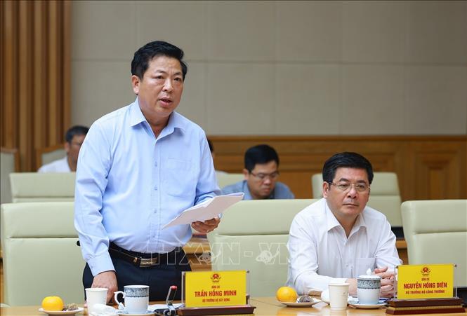 Bộ trưởng Bộ Xây dựng Trần Hồng Minh phát biểu. Ảnh: Dương Giang-TTXVN 
