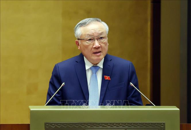 Phó Thủ tướng Thường trực Chính phủ Nguyễn Hòa Bình trình bày Báo cáo tổng kết công tác nhiệm kỳ 2021-2026 của Chính phủ. Ảnh: Phạm Kiên - TTXVN
