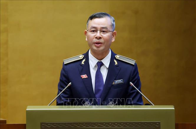 Tổng Kiểm toán Nhà nước Ngô Văn Tuấn trình bày Báo cáo công tác nhiệm kỳ 2021-2026 của Kiểm toán Nhà nước. Ảnh: Phạm Kiên - TTXVN