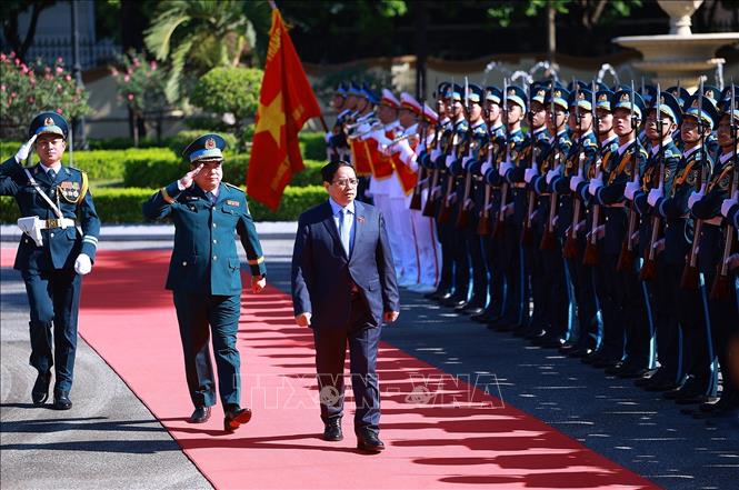 Lễ đón Thủ tướng Phạm Minh Chính đến dự lễ kỷ niệm. Ảnh: Trọng Đức - TTXVN