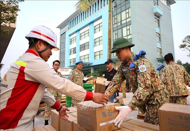 Lực lượng Bệnh viện dã chiến cấp 2 số 2 của Việt Nam tập kết trang thiết bị chuẩn bị lên đường tham gia Gìn giữ hoà bình Liên Hợp quốc (2019). Ảnh: Dương Giang - TTXVN