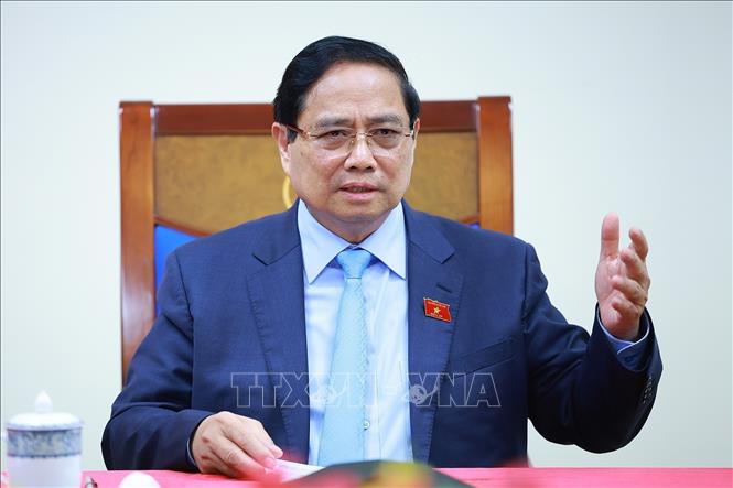 Thủ tướng Phạm Minh Chính điện đàm với Thủ tướng Thái Lan Anutin Charnvirakul. Ảnh: Dương Giang-TTXVN 