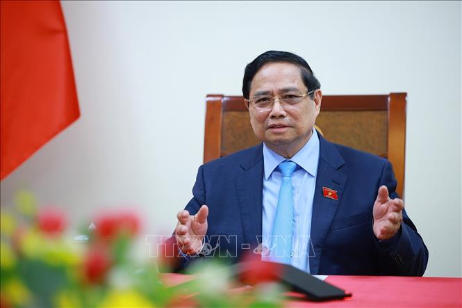 Thủ tướng Phạm Minh Chính điện đàm với Thủ tướng Thái Lan Anutin Charnvirakul. Ảnh: Dương Giang-TTXVN 