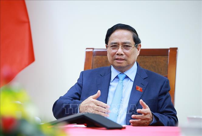 Thủ tướng Phạm Minh Chính điện đàm với Thủ tướng Thái Lan Anutin Charnvirakul. Ảnh: Dương Giang-TTXVN 
