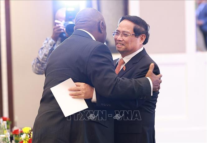 Thủ tướng Phạm Minh Chính và Tổng thống Nam Phi Matamela Cyril Ramaphosa tại Diễn đàn doanh nghiệp Việt Nam-Nam Phi. Ảnh: Dương Giang - TTXVN