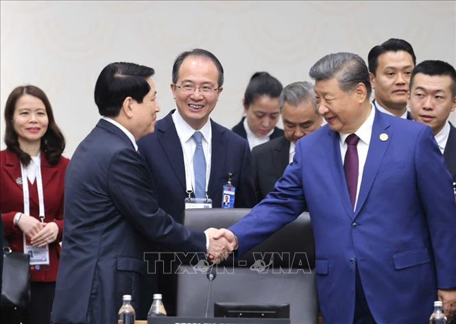 Chủ tịch nước Lương Cường với Tổng Bí thư, Chủ tịch nước Trung Quốc Tập Cận Bình. Ảnh: Lâm Khánh - TTXVN