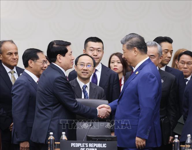 Chủ tịch nước Lương Cường với Tổng Bí thư, Chủ tịch nước Trung Quốc Tập Cận Bình. Ảnh: Lâm Khánh - TTXVN