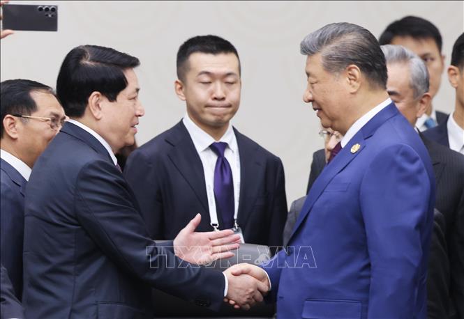 Chủ tịch nước Lương Cường với Tổng Bí thư, Chủ tịch nước Trung Quốc Tập Cận Bình. Ảnh: Lâm Khánh - TTXVN