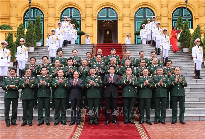 Chủ tịch nước Lương Cường với các đại biểu Bộ Quốc phòng. Ảnh: Lâm Khánh - TTXVN