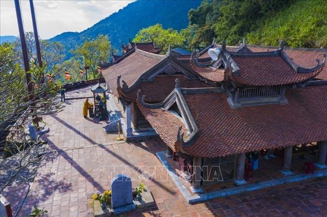 Hoa Yen Pagoda was built during the Ly Dynasty and has been restored many times throughout history. The pagoda is located halfway up the mountain, facing southwest. VNA Photo: Minh Đức