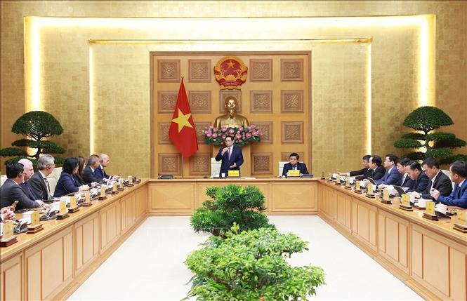 Thủ tướng Phạm Minh Chính tiếp đoàn lãnh đạo doanh nghiệp bán dẫn quốc tế. Ảnh: Dương Giang-TTXVN
