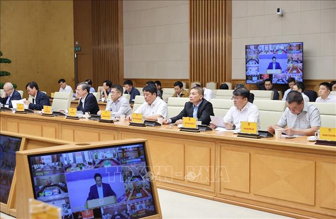 Các nhà thầu, đơn vị thi công tham dự Phiên họp lần thứ 21 của Ban Chỉ đạo. Ảnh: Dương Giang-TTXVN
