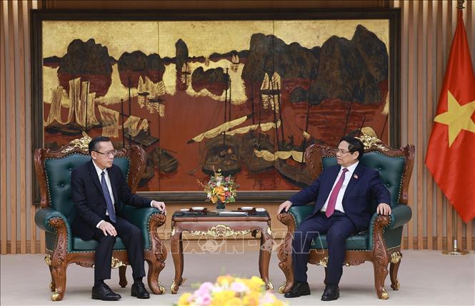 Thủ tướng Phạm Minh Chính tiếp ông Phoxay Sayasone, Bộ trưởng Bộ Lao động và Phúc lợi xã hội Lào. Ảnh: Dương Giang-TTXVN
