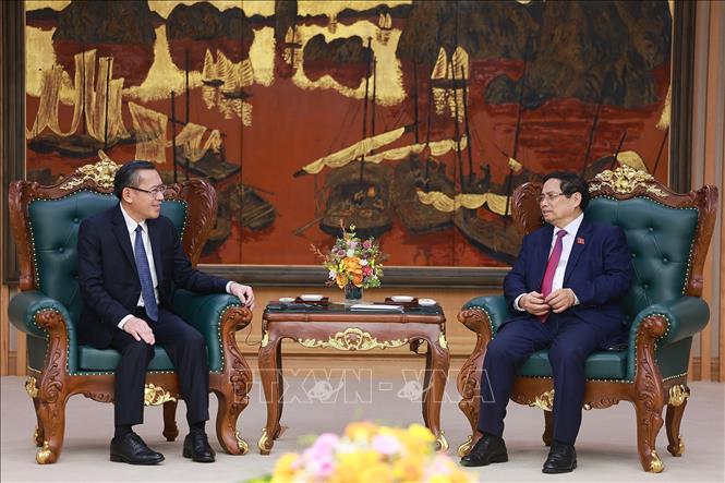 Thủ tướng Phạm Minh Chính tiếp ông Phoxay Sayasone, Bộ trưởng Bộ Lao động và Phúc lợi xã hội Lào. Ảnh: Dương Giang-TTXVN
