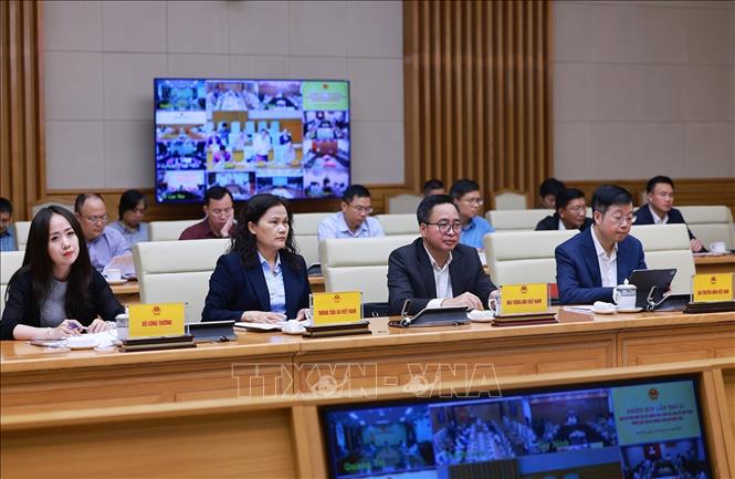 Delegates attend the meeting. VNA Photo: Dương Giang
