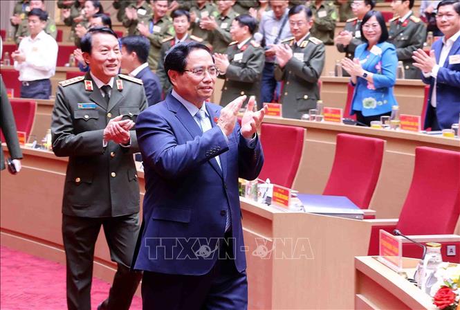 Thủ tướng Phạm Minh Chính dự Hội nghị Sơ kết 01 năm triển khai lực lương tham gia bảo vệ an ninh, trật tự ở cơ sở. Ảnh: Phạm Kiên - TTXVN