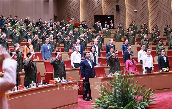 Thủ tướng Phạm Minh Chính dự Hội nghị Sơ kết 01 năm triển khai lực lương tham gia bảo vệ an ninh, trật tự ở cơ sở. Ảnh: Dương Giang-TTXVN