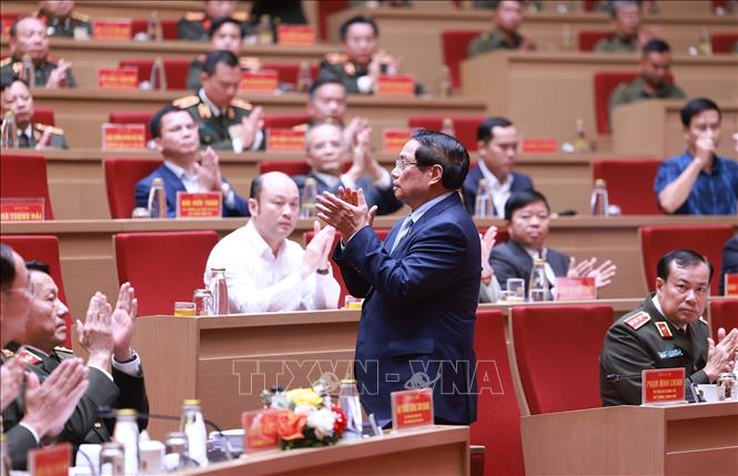 Thủ tướng Phạm Minh Chính dự Hội nghị Sơ kết 01 năm triển khai lực lương tham gia bảo vệ an ninh, trật tự ở cơ sở. Ảnh: Dương Giang-TTXVN