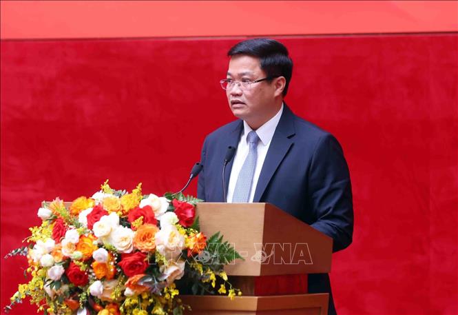 Thứ trưởng Bộ Tài chính Nguyễn Đức Tâm trình bày tham luận. Ảnh: Phạm Kiên - TTXVN