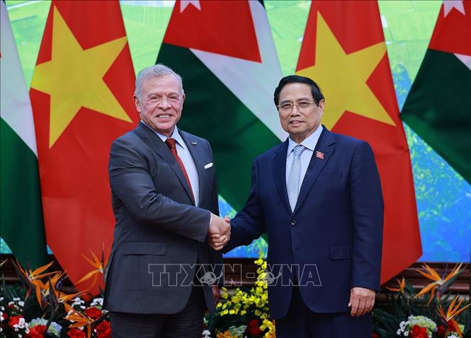 Thủ tướng Phạm Minh Chính hội kiến Quốc vương Jordan Abdullah II Ibn Al Hussein. Ảnh: Dương Giang-TTXVN 
