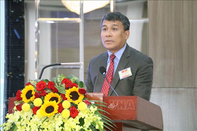 Đồng chí Nguyễn Minh Vũ, Ủy viên Dự khuyết Trung ương Đảng, Thứ trưởng Thường trực Bộ Ngoại giao tham luận. Ảnh: Đại Nghĩa - TTXVN