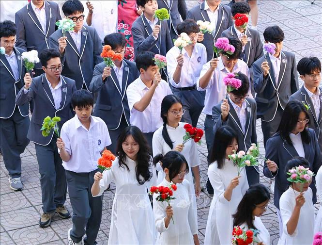 Màn diễu hành đậm nét truyền thống của nhà trường trong lễ kỷ niệm. Ảnh: Thanh Tùng - TTXVN