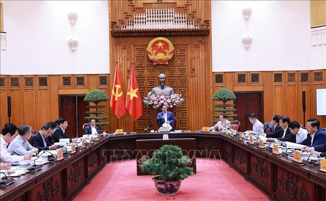 Thủ tướng Phạm Minh Chính chủ trì họp về dự án quy hoạch xây dựng cảnh quan sông Hồng. Ảnh: Dương Giang-TTXVN
