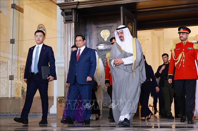 Thủ tướng Phạm Minh Chính và Thủ tướng Nhà nước Kuwait Sheikh Ahmad Abdullah Al-Ahmad Al Sabah. Ảnh: Dương Giang-TTXVN
