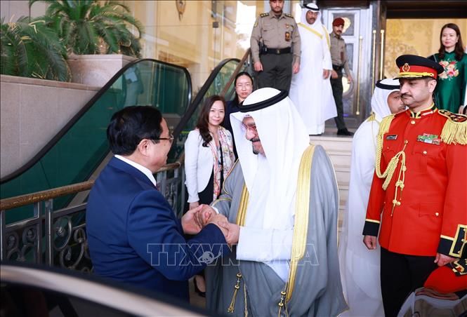 Thủ tướng Phạm Minh Chính và Thủ tướng Nhà nước Kuwait Sheikh Ahmad Abdullah Al-Ahmad Al Sabah. Ảnh: Dương Giang-TTXVN
