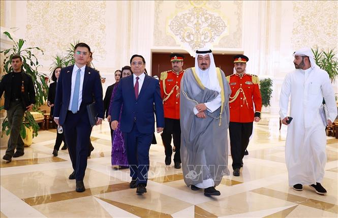 Thủ tướng Phạm Minh Chính và Thủ tướng Nhà nước Kuwait Sheikh Ahmad Abdullah Al-Ahmad Al Sabah. Ảnh: Dương Giang-TTXVN
