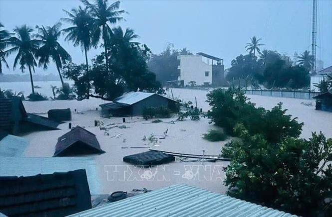 Mưa lớn trong những ngày qua gây ngập lụt trên diện rộng, chia cắt nhiều khu vực dân cư ở phía Đông tỉnh Đắk Lắk. Ảnh: TTXVN phát